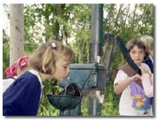 Children at hand pump.