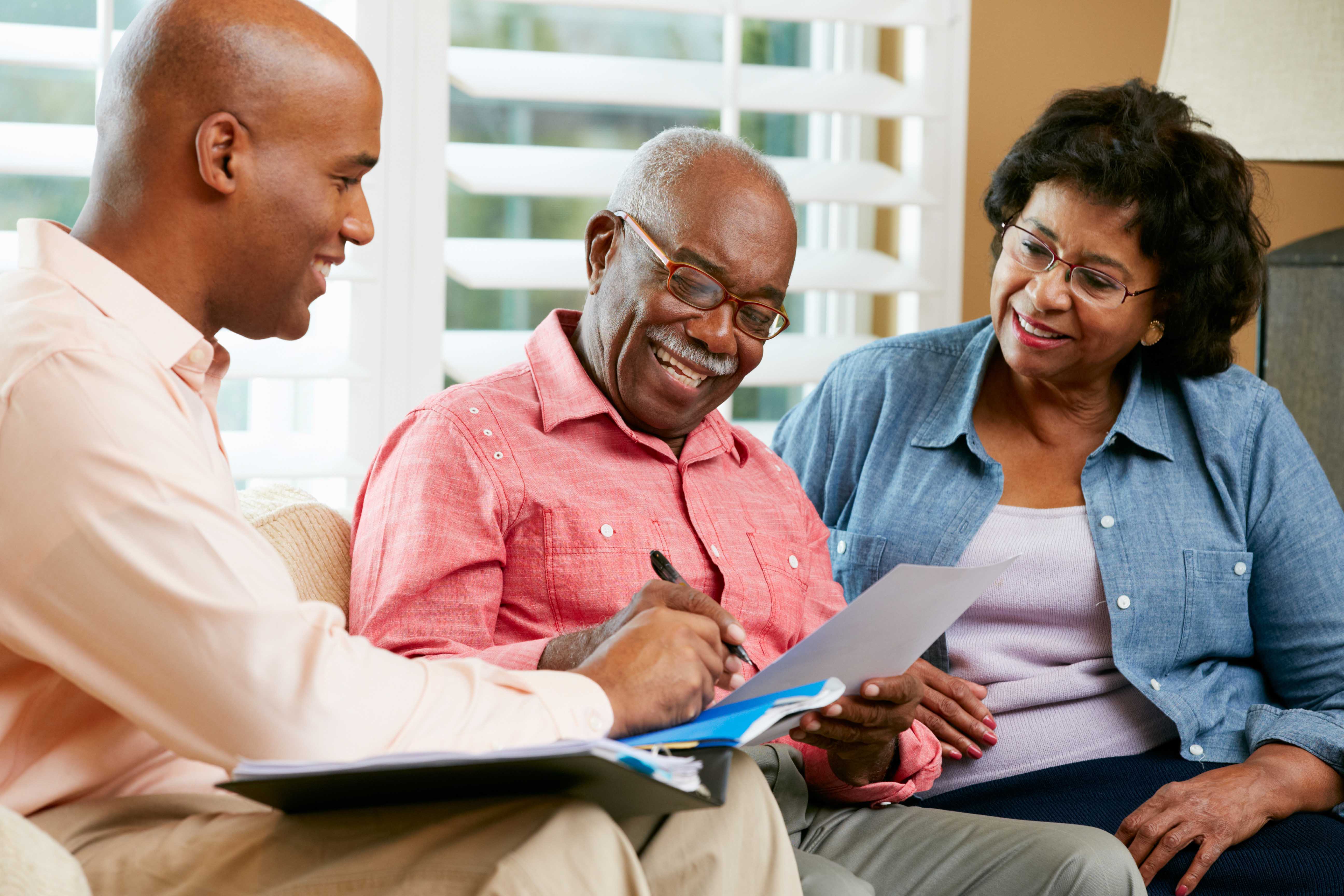 African American elders talking with a community health worker