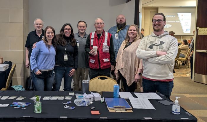 Staff from Beltrami County and the Red Cross greet attendees at an emergency preparedness shelter training in April 2025.
