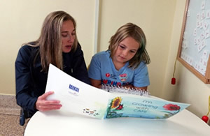 Ann reading with Ashley