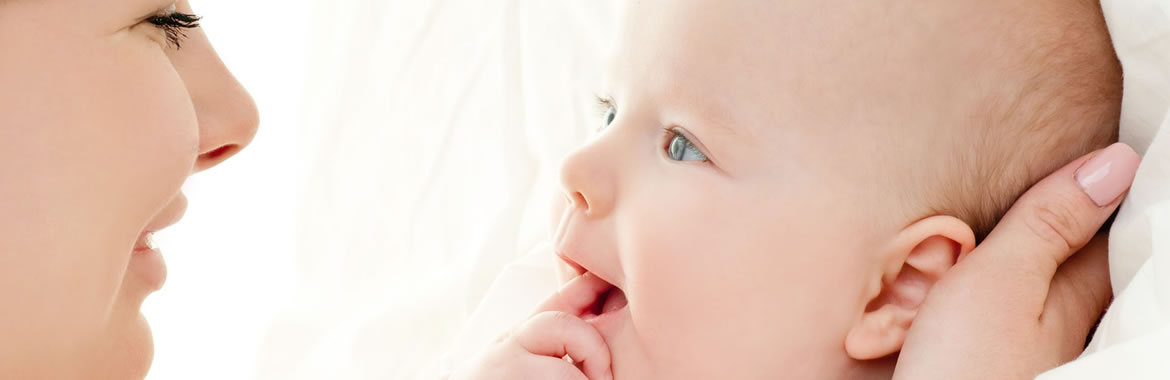 Woman and baby gazing at each other